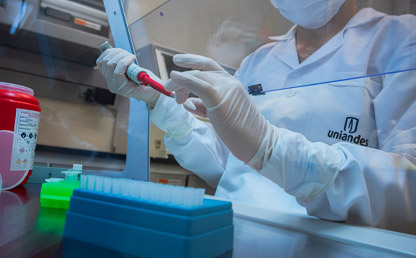 Person in laboratory doing covid-19 tests